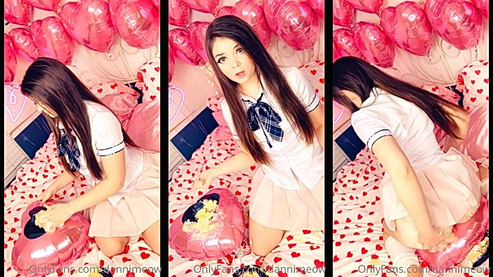 sexy schoolgirl Danni Meow cutting her birthday cake on live stream