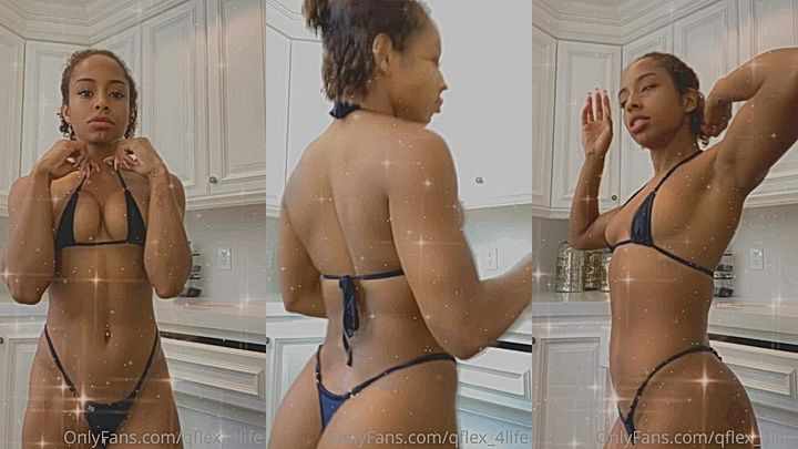ebony chick Qimmah Russo flexing her perfect toned body in the kitchen