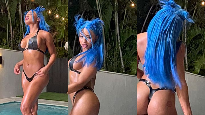 ebony supermodel Qimmah Russo blue hair photoshoot by the pool