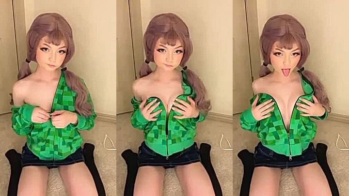 camgirl Strawbeariemilkk teasing her naked tits in her green jacket