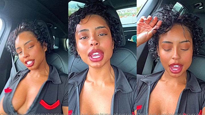 ebony babe Qimmah Russo showing off her deep cleavage in the car