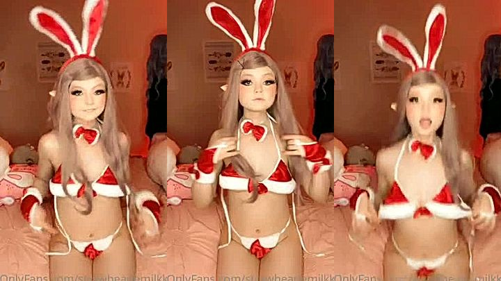 cosplay girl Strawbeariemilkk teasing in her christmas bunny