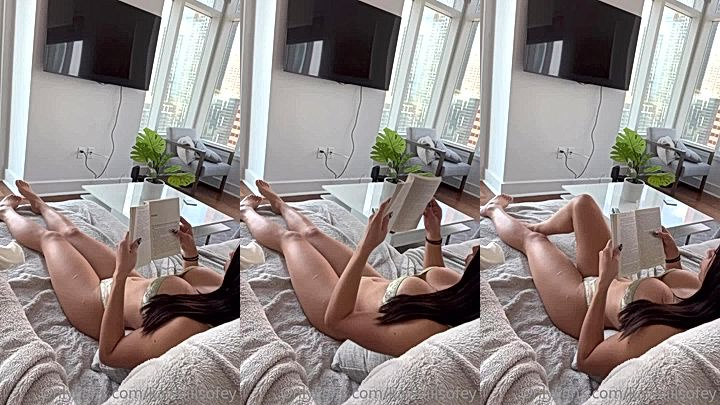 hot girl Aishah Sofey reading a book in her sexy lingerie