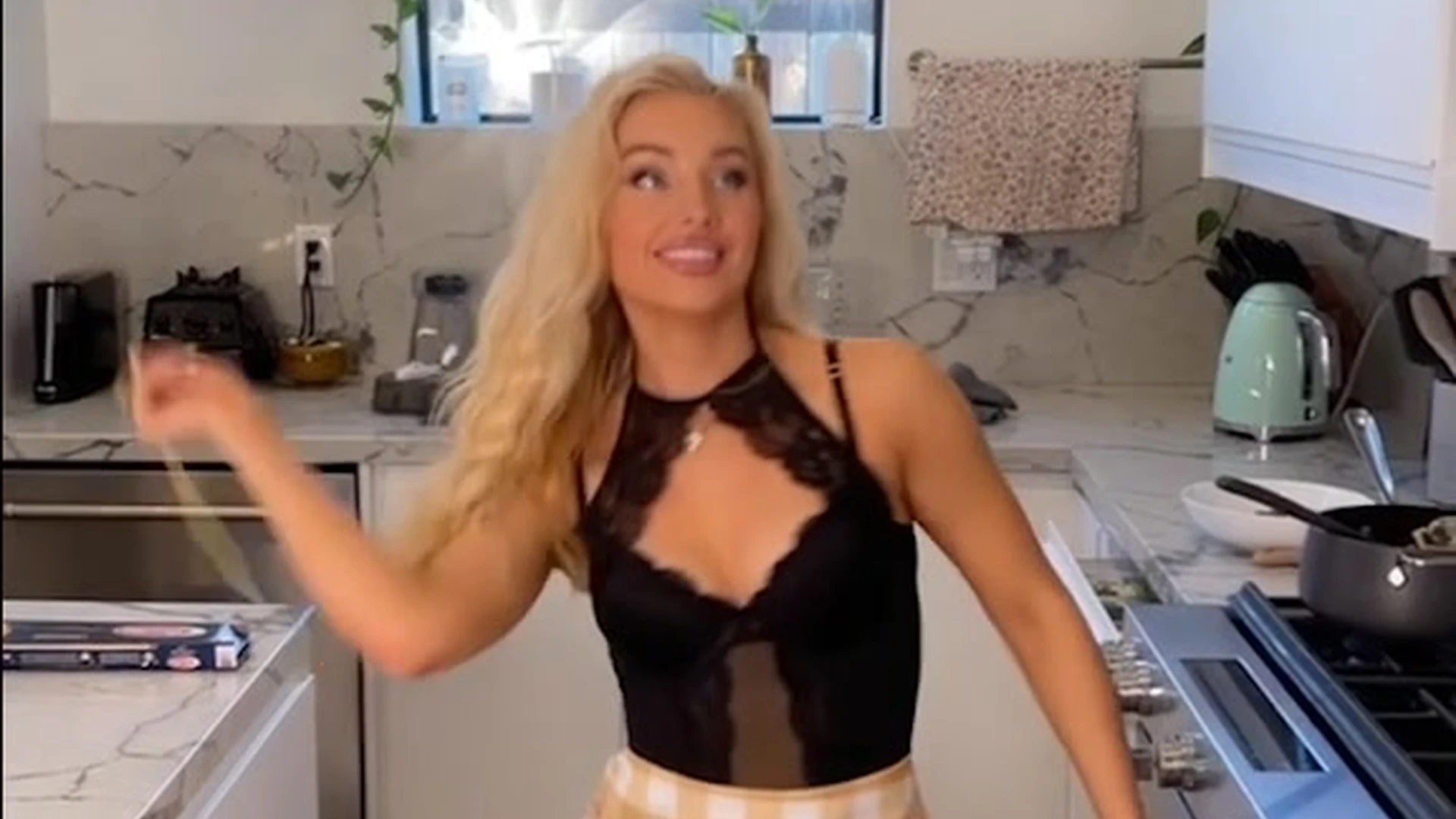Charlotte Parkes two sexy babes cooking some pasta in the kitchen
