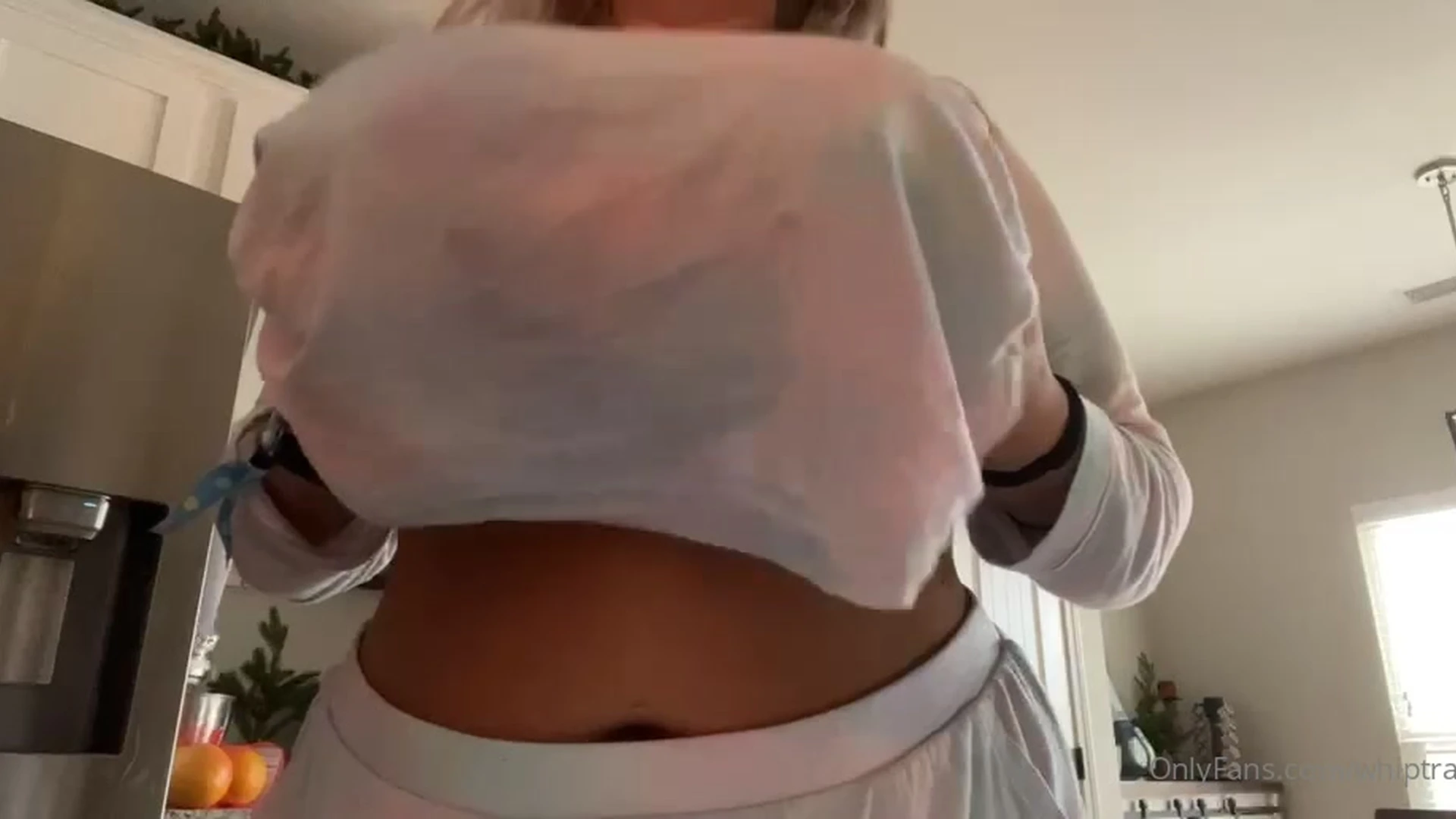 Whiptrax playing and flashing her big tits in the kitchen