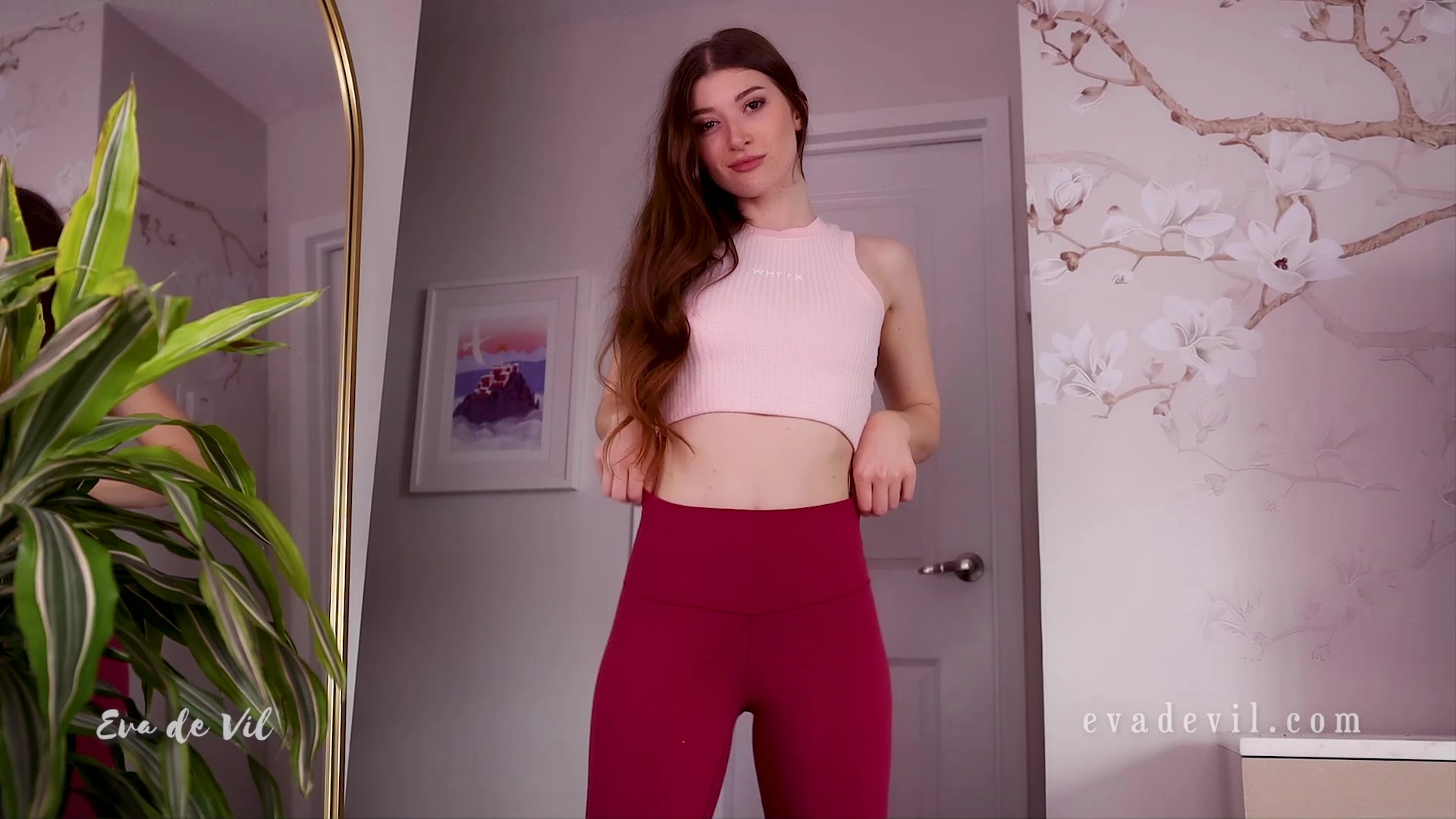 Eva de Vil teasing in her sexy red leggings