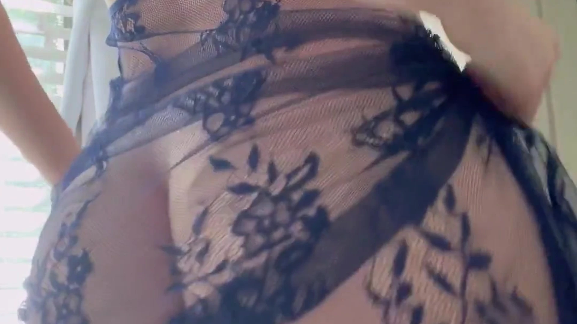 Cutefruit18 showing off her big ass in her black see-through gown