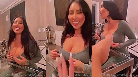 Marie Madore stripping and teasing her big tits with a friend