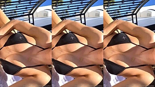 Lauren Dascalo teasing her perky tits in her black bikini