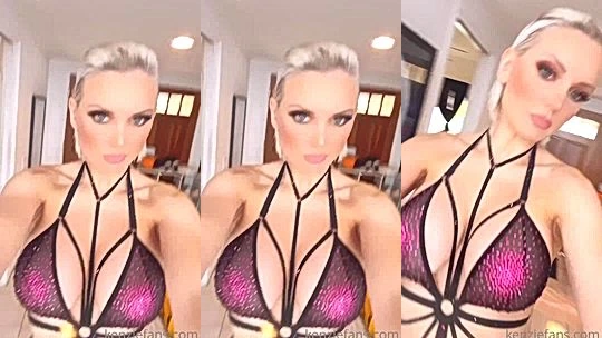 Kenzie Taylor teasing her big tits in her string lingerie