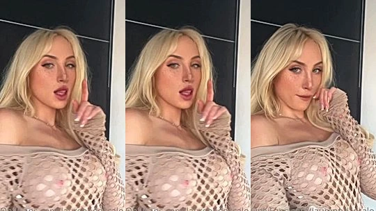 Lauren Dascalo teasing her naked tits in her fishnet top