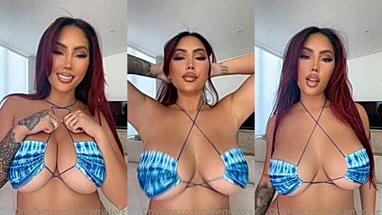 onlyfans Asian slut Marie Madore flashing her big naked tits in her blue bikini