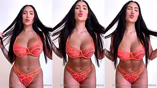Marie Madore teasing her sexy body in her string lingerie