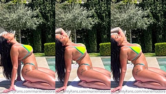 Marie Madore teasing her hot bikini body by the poolside