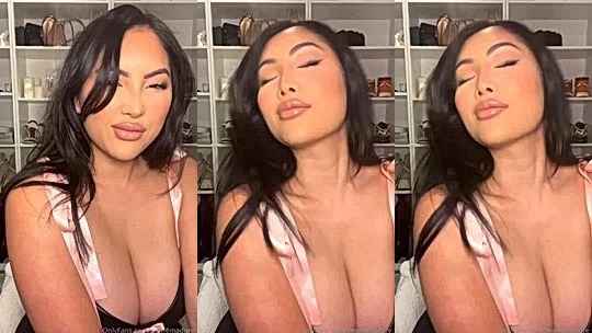 Marie Madore teasing her big tits in her black lingerie