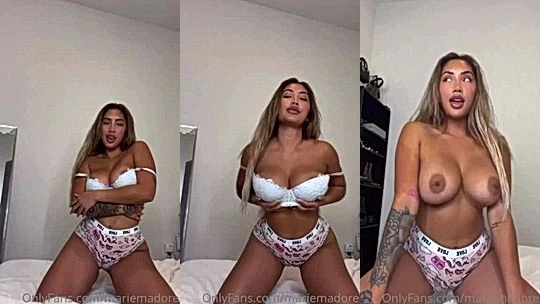 Marie Madore showing of her naked perky tits in her lingerie