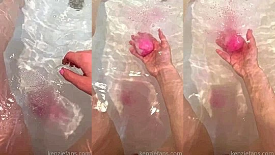 Kenzie Taylor teasing her naked feet in the bathtub