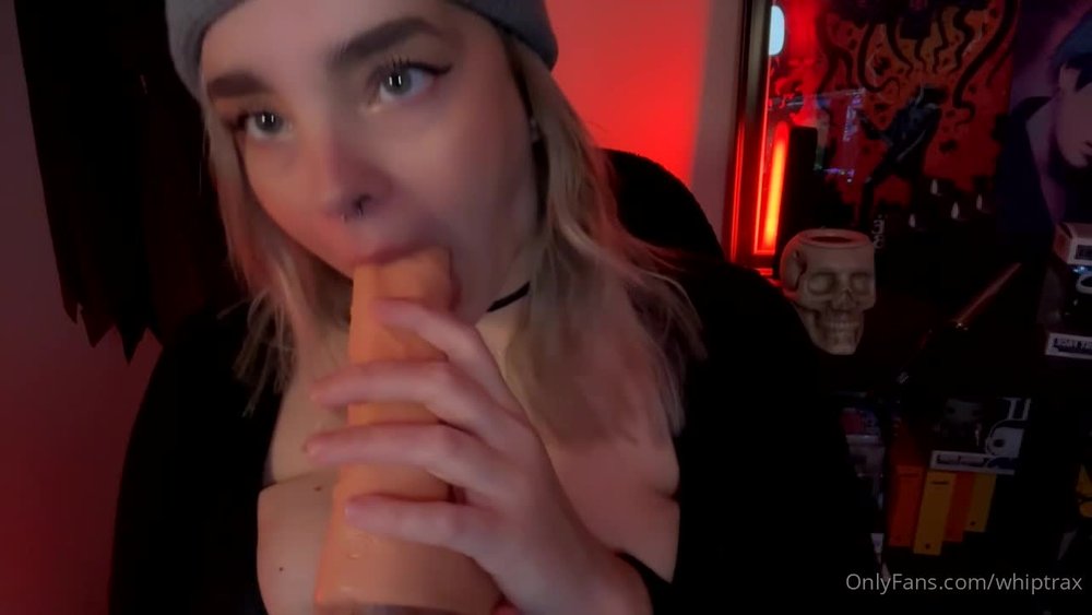 Whiptrax sucking on a big white dildo