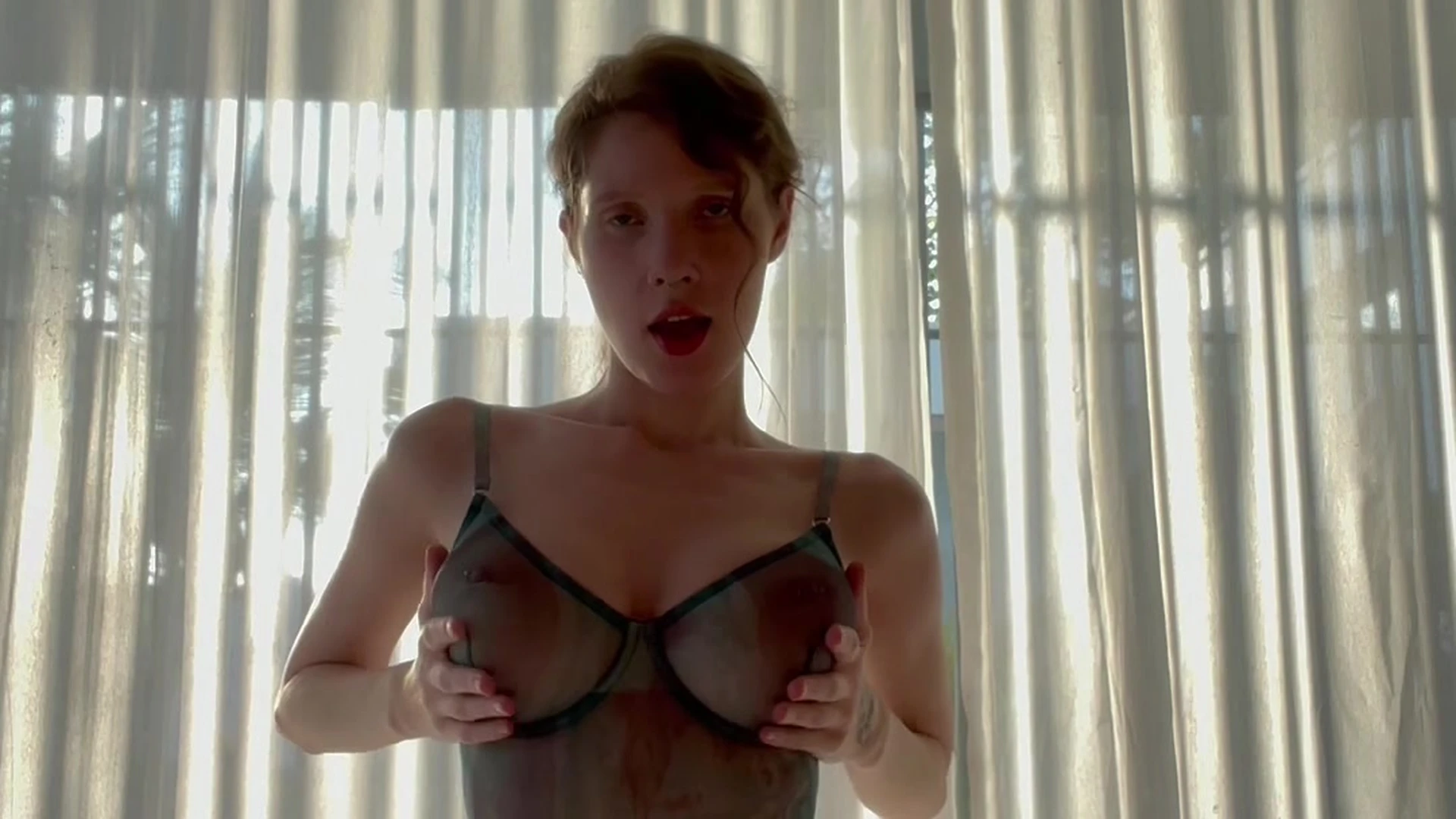 Lilithbrik playing with her big tits in her black see-through lingerie
