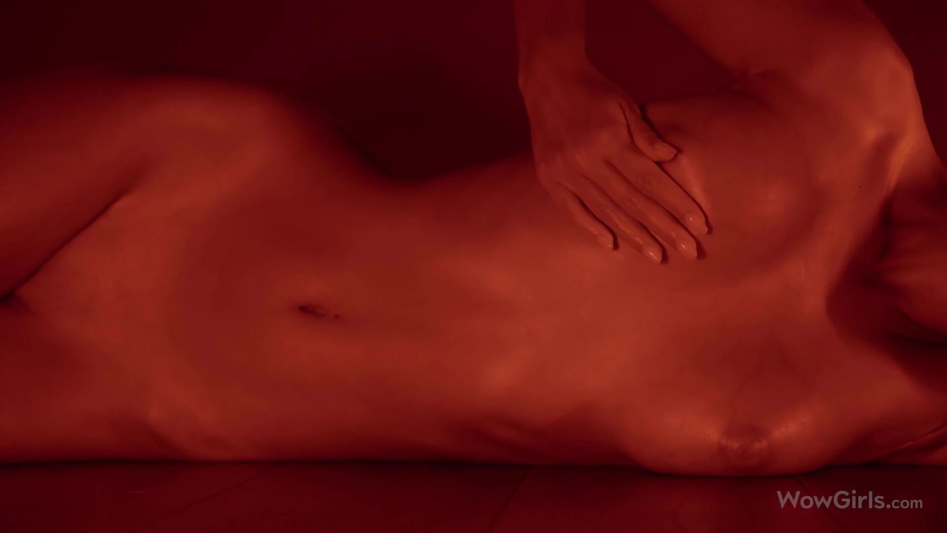 Sonya Blaze playing with her oiled-up naked body