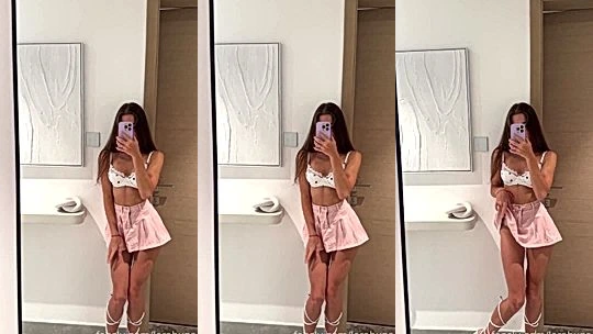 Lerabuns teasing her pink skirt in the bathroom