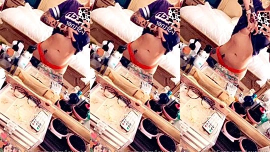 Laura Lux flashing her big tits in the mirror