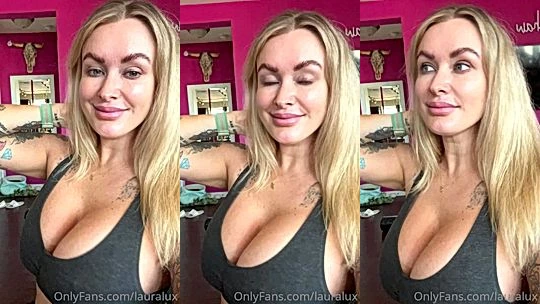 Laura Lux teasing her big tits in her black top
