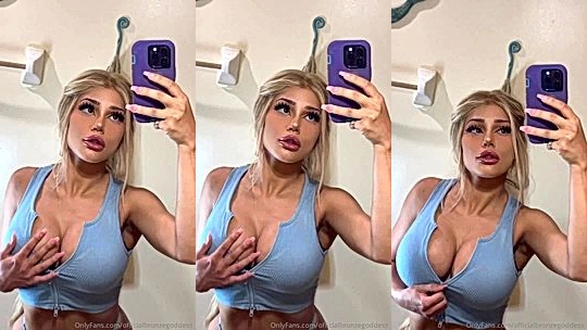 Officialbronzegoddess teasing her fit body in the bathroom mirror