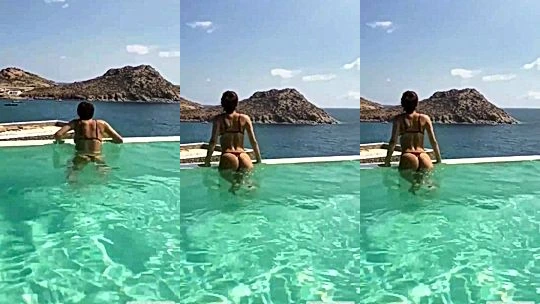 Mirasjuice teasing her naked body in the pool