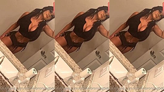 Officialbronzegoddess teasing her hot body in the bathroom mirror