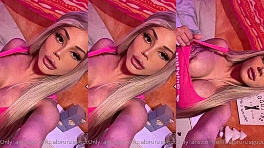 Officialbronzegoddess teasing her big tits in her pink top