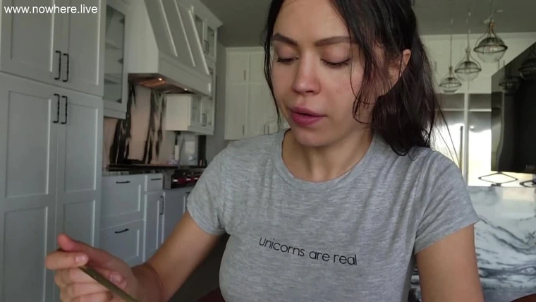 Mirasjuice making lunch braless in her tight t-shirt