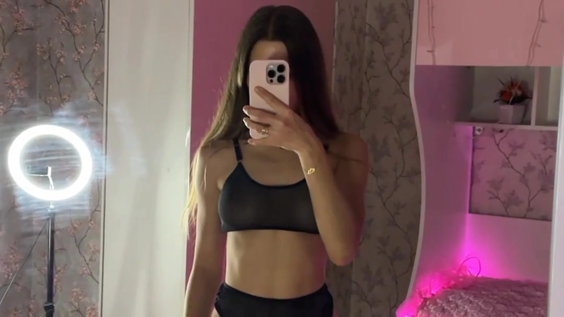 Lerabuns teasing her tits in her black see-through outfit