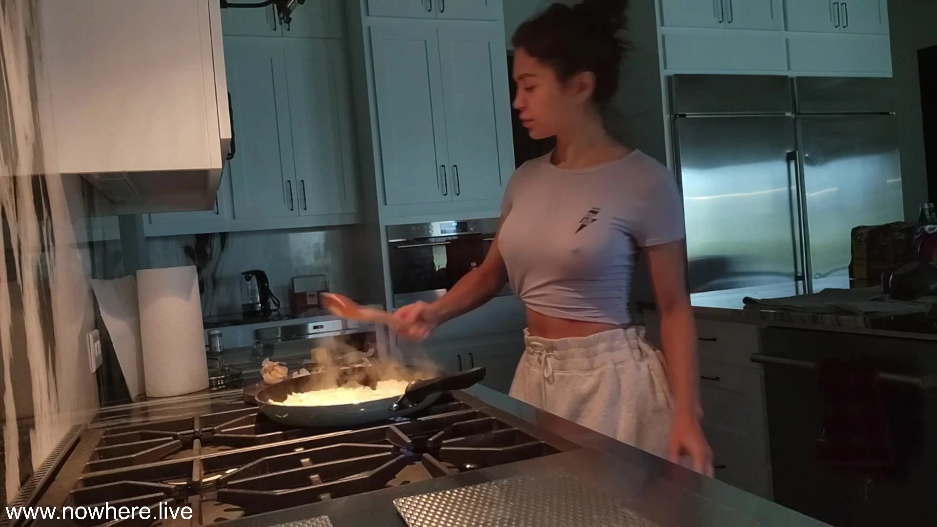 Mirasjuice cooking dinner in her see-through t-shirt