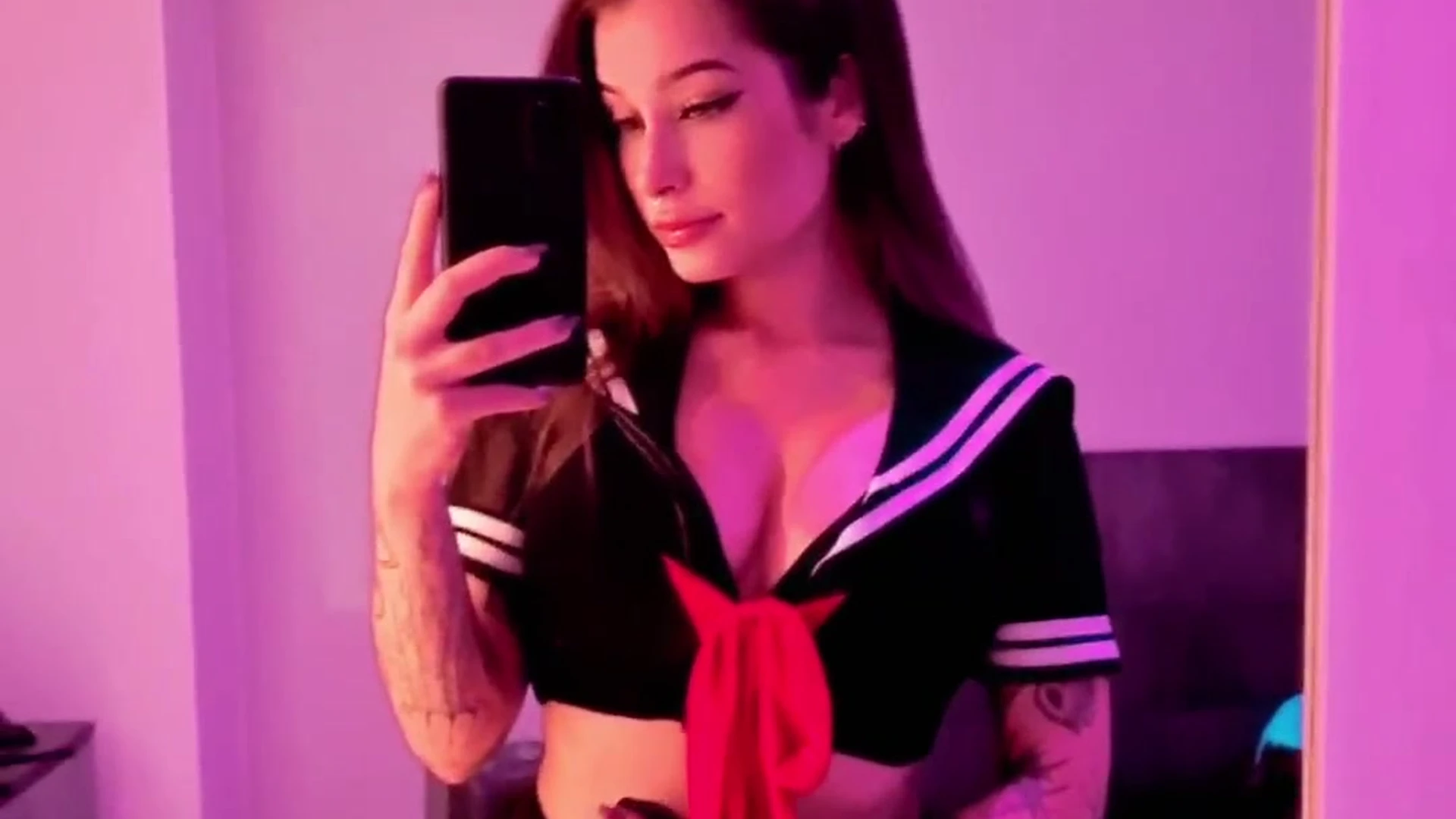 Akumagirl teasing her japanese schoolgirl cosplay