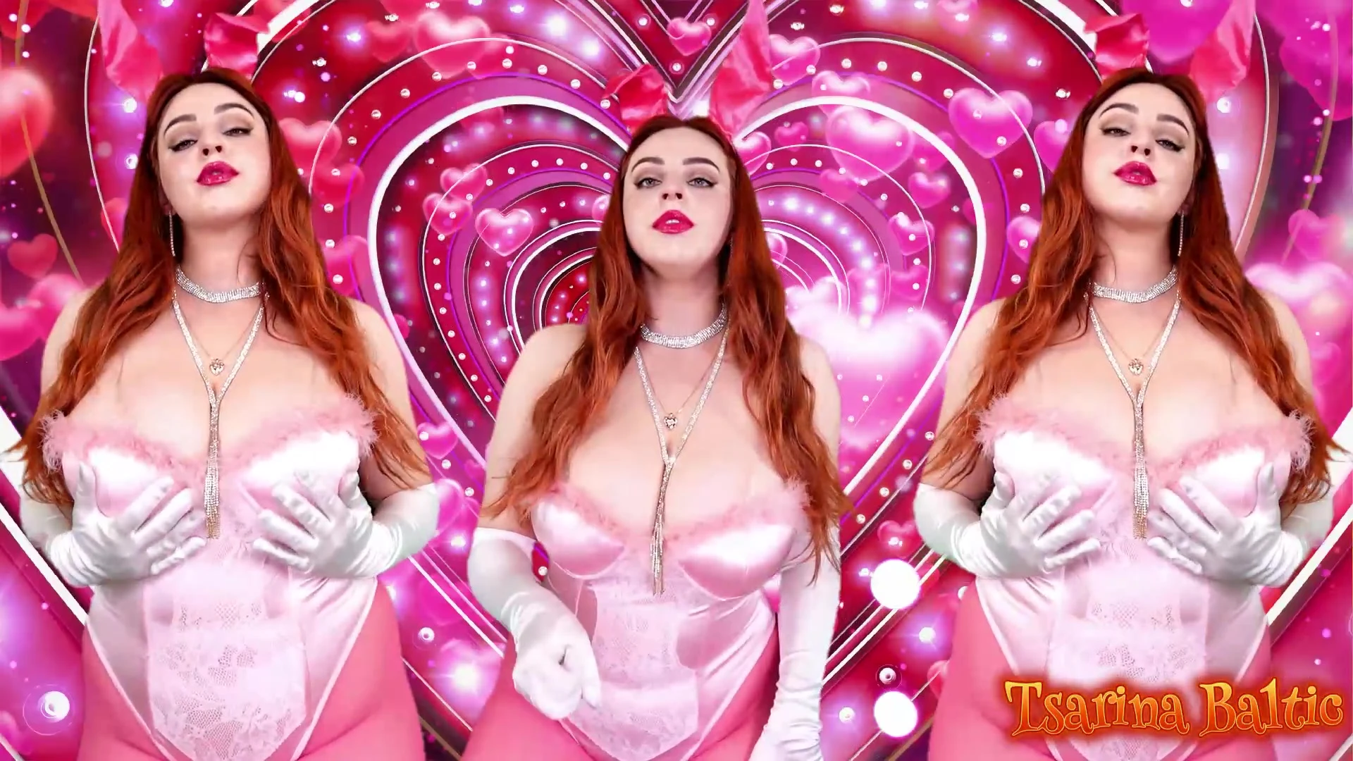Tsarina Baltic playing with her big tits in her pink bodysuit