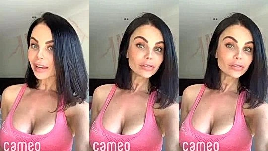Emma Glover teasing her deep cleavage