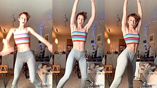 AliceOnCam danding in her rainbow top braless