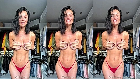 Emma Glover flashing her naked perky tits in her red panties