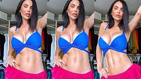 Emma Glover teasing her blue bra in the changing room