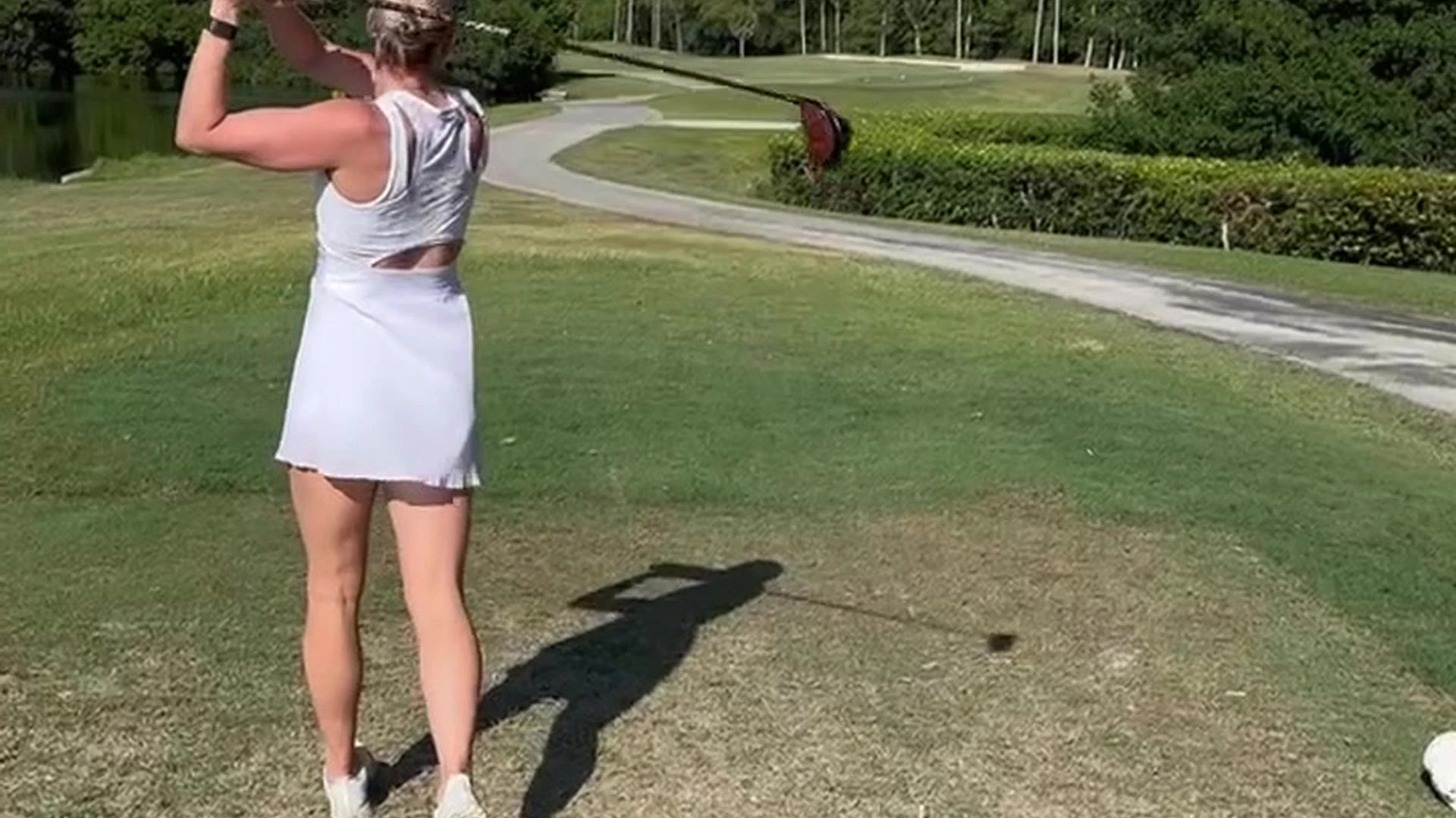Alysha Newman teasing her booty while playing golf