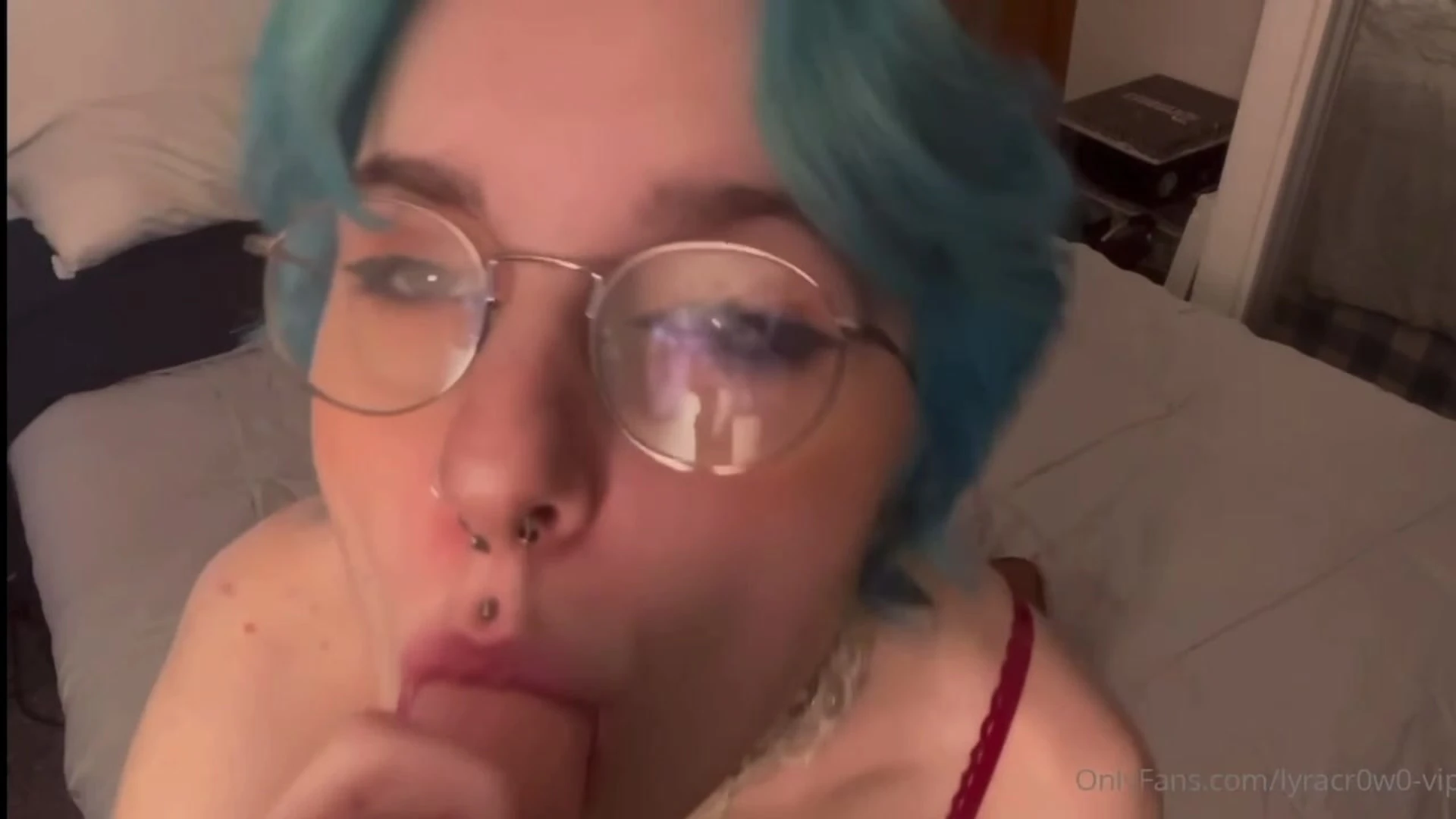 Lyra crow sucking on a big dildo in red lingerie