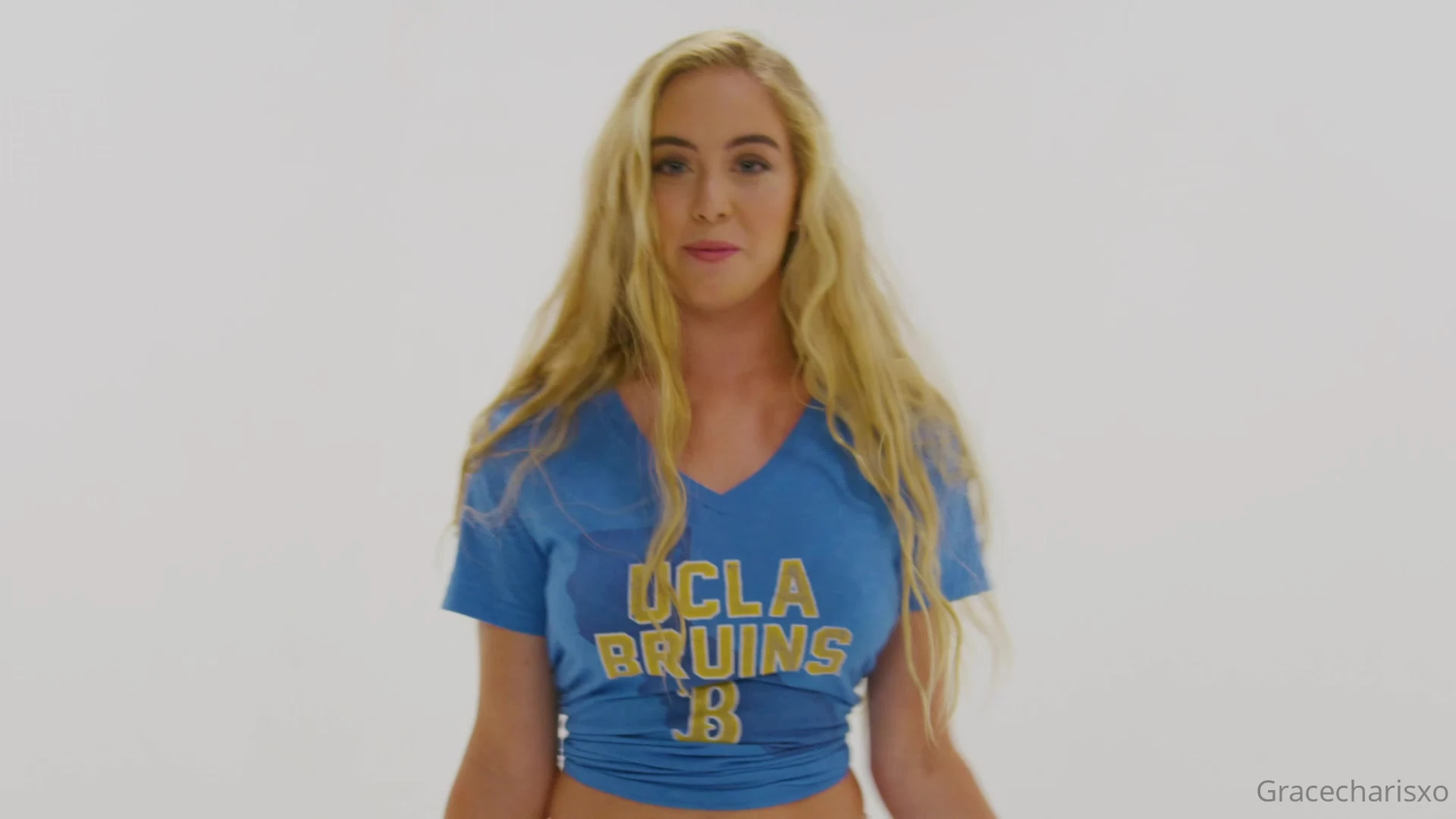Grace Charis teasing her big tits in blue top