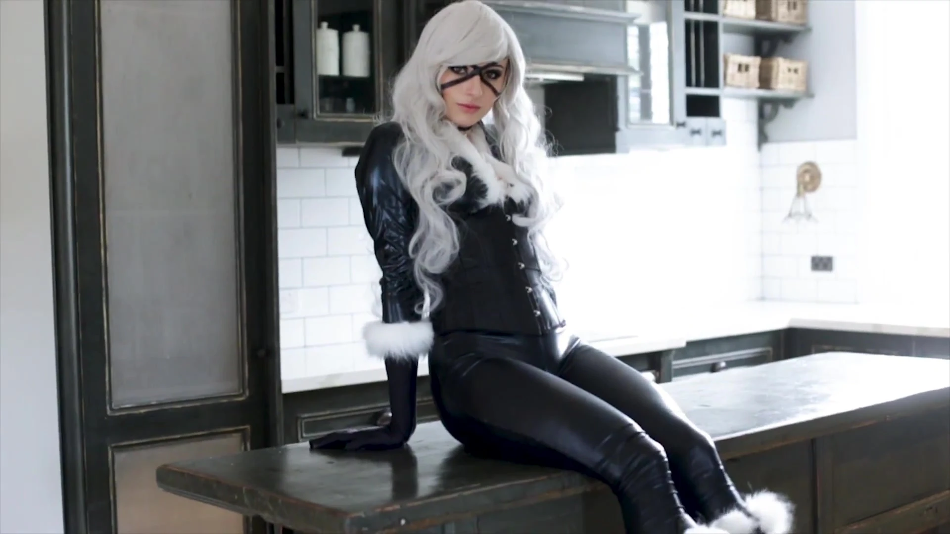 sexy cat woman Kayla Erin in full latex bodysuit