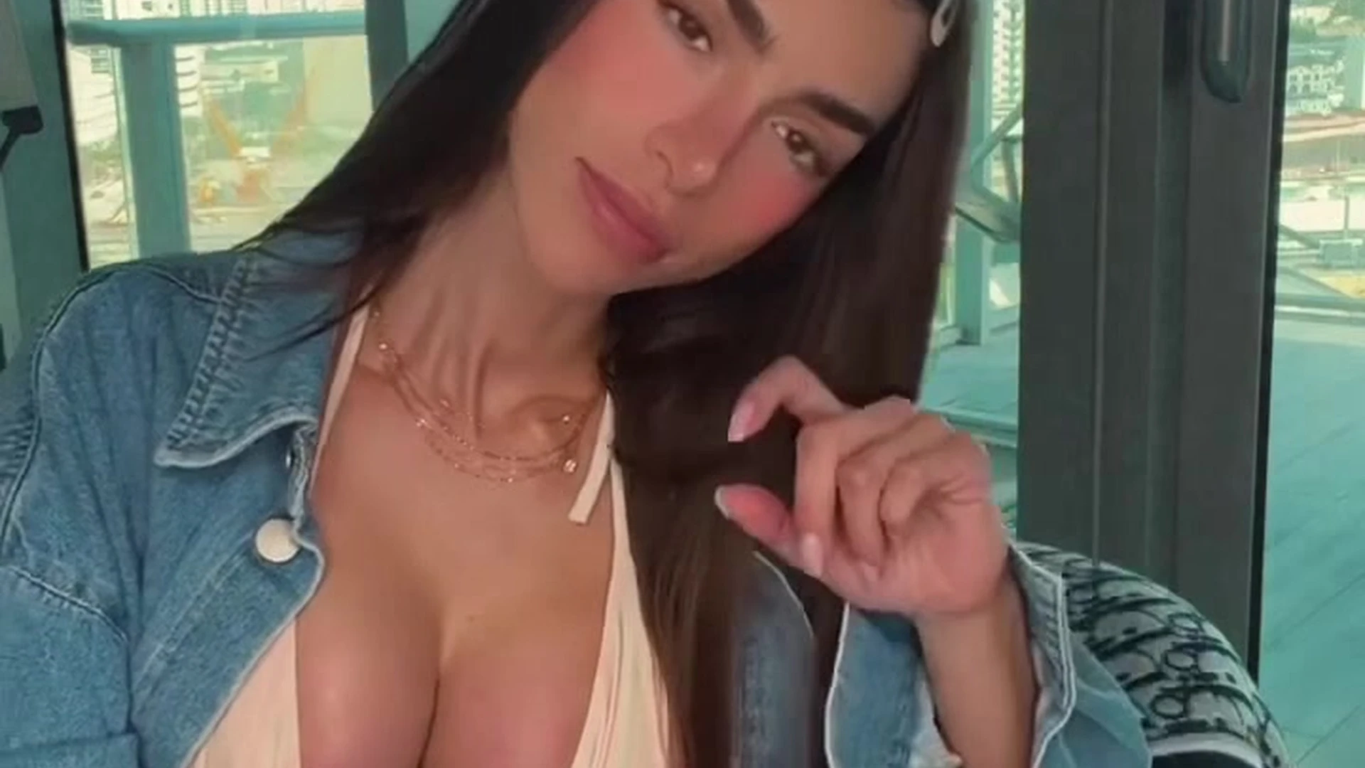 Anllela Sagra teasing her sexy big tits in white bikini