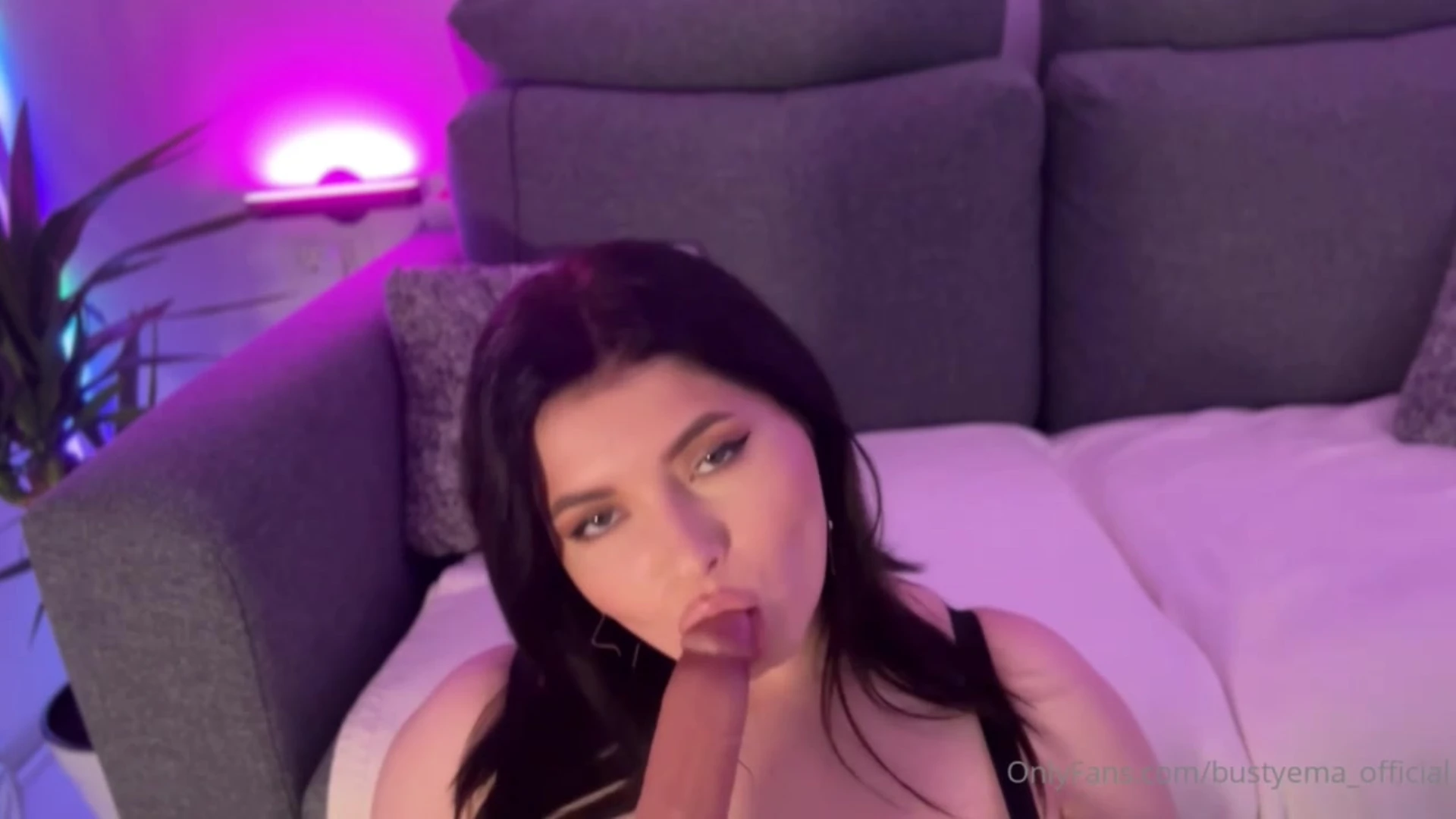 Busty Ema deepthroat sucking on a big dildo