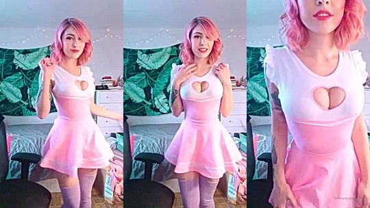 Luxlo playing with her perky tits in pink dress