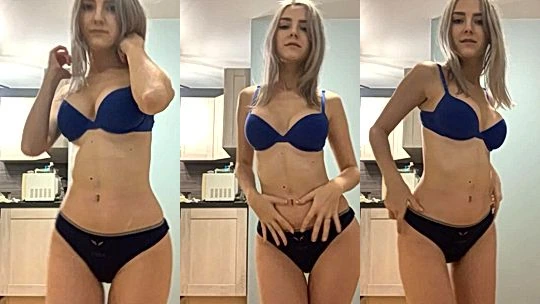 Eva Elfie teasing her black lingerie in the kitchen