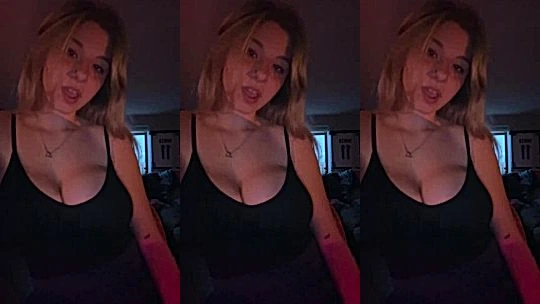 Lynntoria teasing her big boobies in black dress