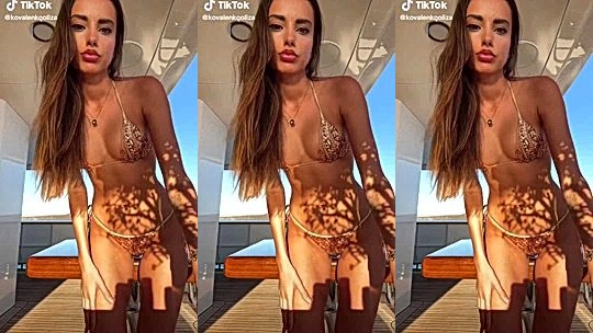 Liza Kovalenko teasing her golden bikini